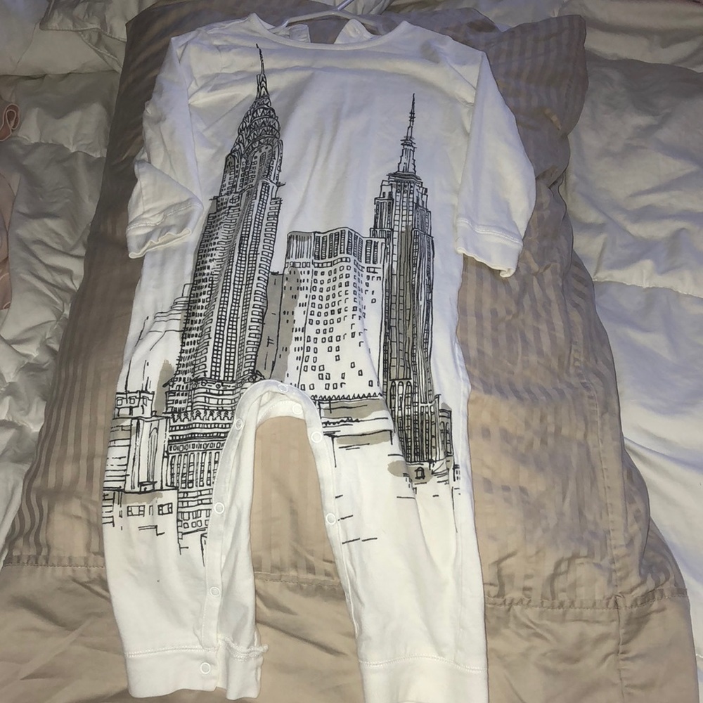 Burberry coverall with building. White. Unique.